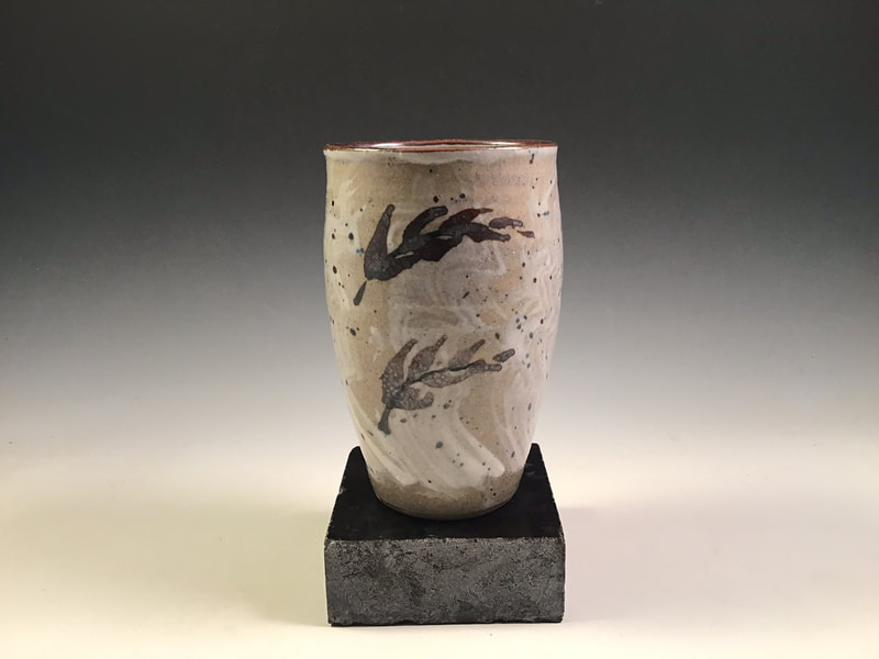 Cylindrical Vase, decorated with Hakeme slip and iron oxide. 4.75” tall. Signed.
$68 Includes shipping to the lower 48.
Contact Simon at: simonleachpottery@gmail.com