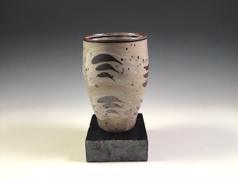 Cylindrical Vase, decorated with Hakeme slip and iron oxide. 4.75” tall. Signed.
$68 Includes shipping to the lower 48.
Contact Simon at: simonleachpottery@gmail.com